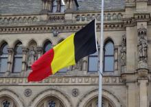 "Belgian flag at Half-mast, City Hall, Bradford" by sgwarnog2010, licensed under CC BY-NC-SA 2.0.