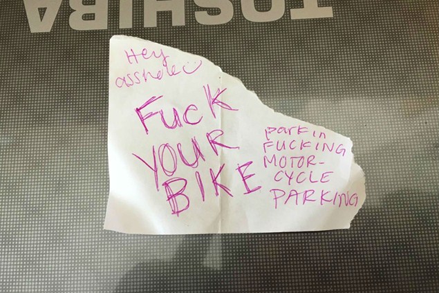 Rude note left on a motorcycle